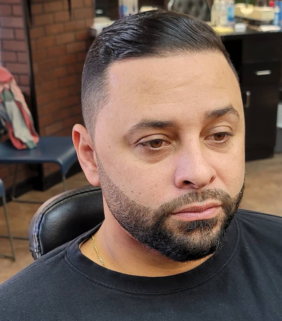 A fresh cut finished with a shaped beard