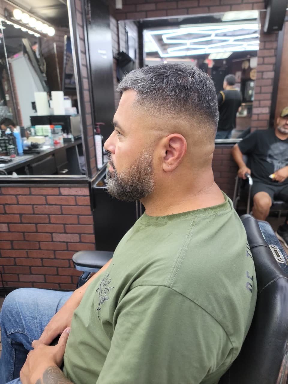 A finished men's haircut, second angle